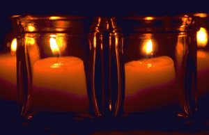 CandlesInsideGlassContainers